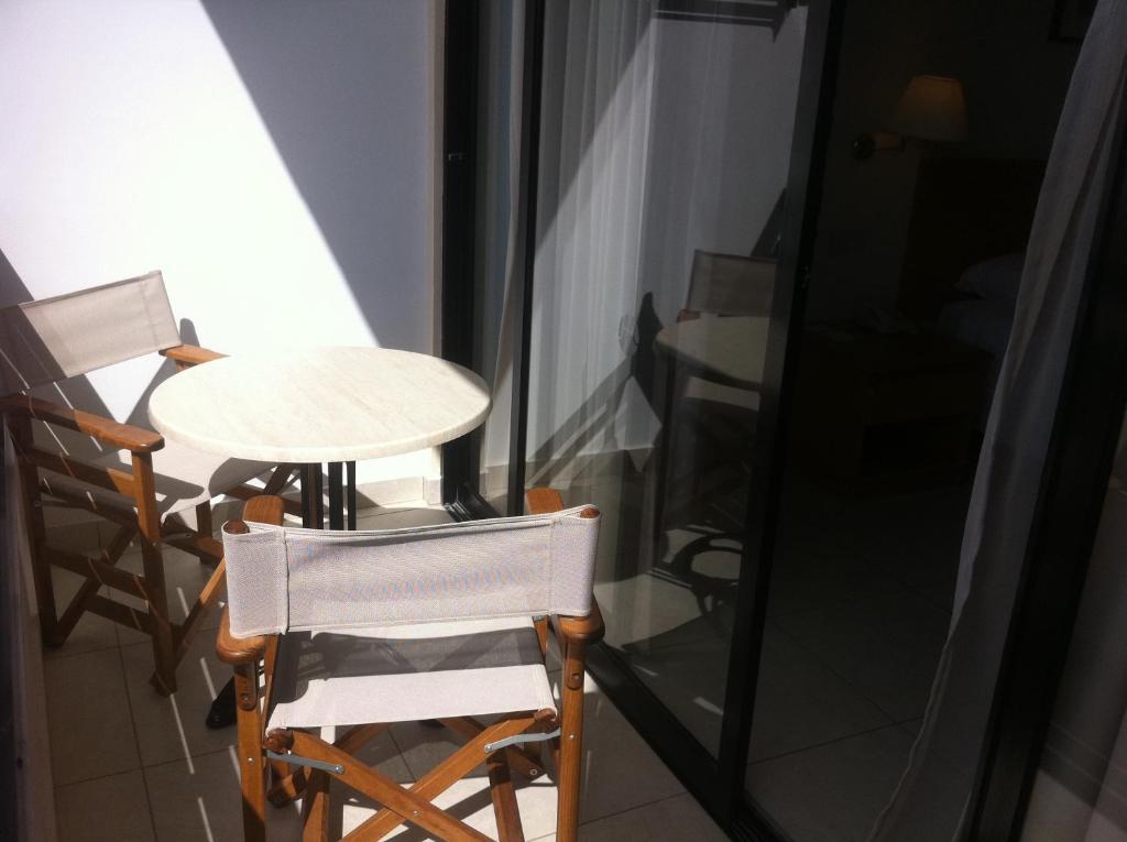 Double or Twin Room with Inland View (2 Adults + 2 Children)